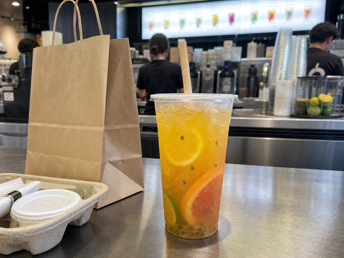 Pickup counter packaging setup for online orders with drink and takeout supplies